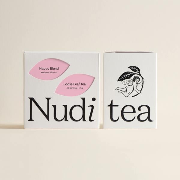 Nuditea happy blend luxury tea box with two pink leaf designs on a white background.