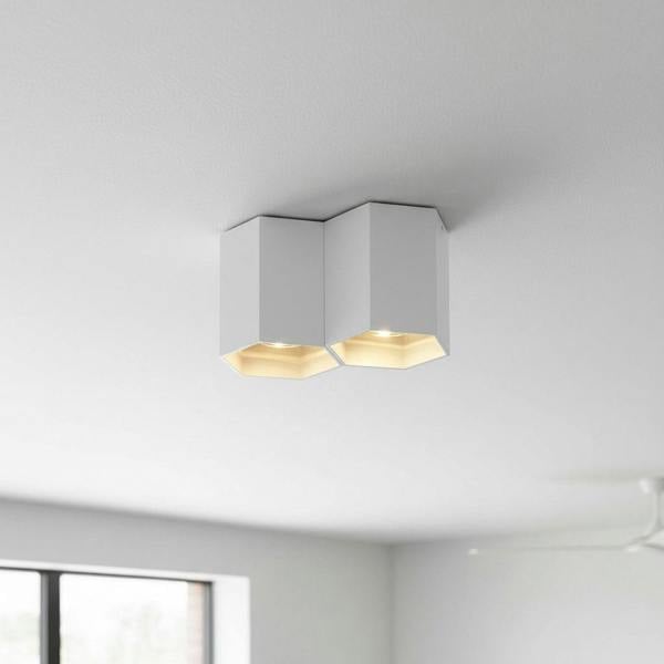 white contemporary ceiling light mounted on a living room ceiling 