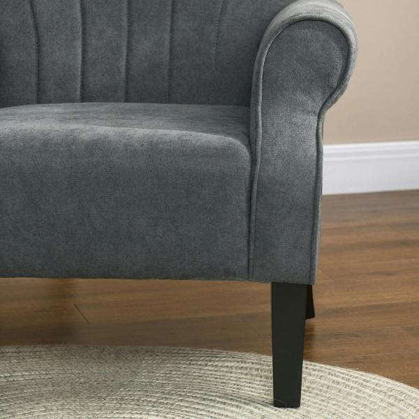 Close-up of grey rolled arm and seat cushion on upholstered chair