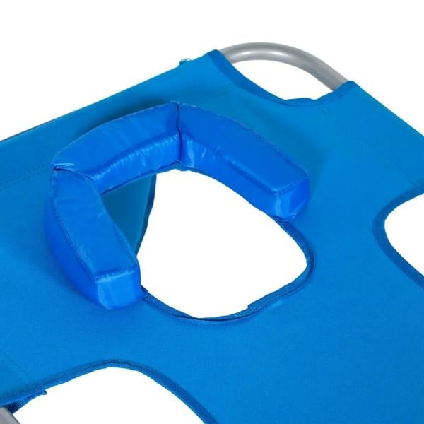 Close-up of blue sun lounger reading hole with padded headrest, foldable steel frame