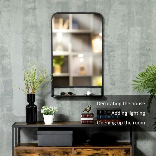 Black wall mirror with storage shelf, reflective glass and lower rail