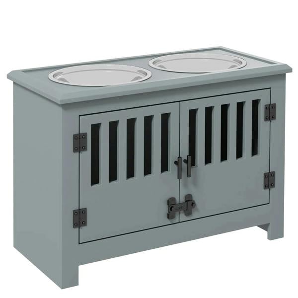 Grey raised dog feeding station with two stainless bowls and front storage doors with latches