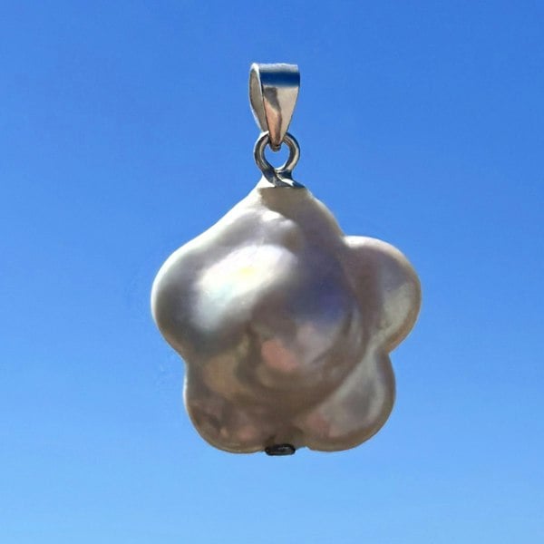 Flower-shaped baroque pearl pendant charm handmade in London by LENAE.