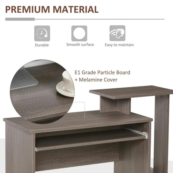 Grey computer desk showing sliding keyboard tray rail and melamine-covered tabletop