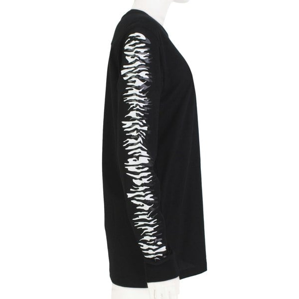 Proenza Schouler black long sleeve top with zebra print sleeves
