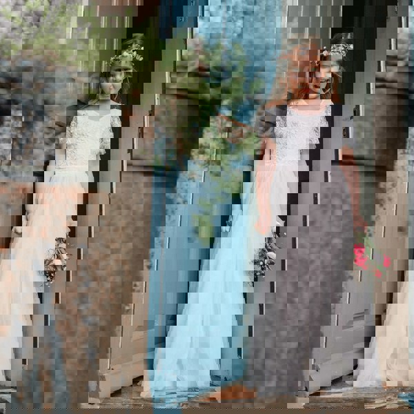 Floor Girl wearing a Flutter Dress in Ivory