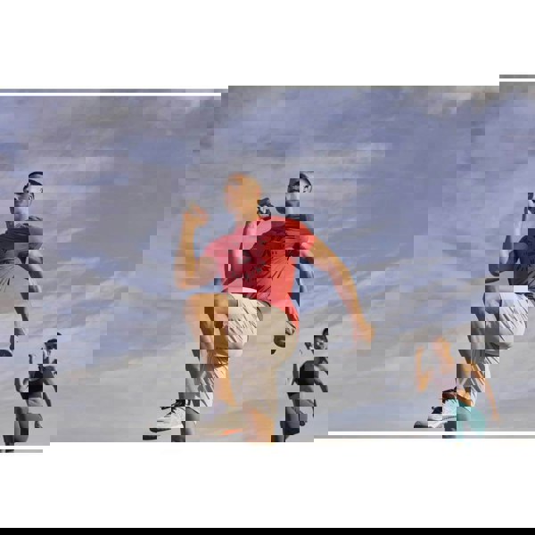 Man and woman exercising with Reebok 2kg Dumbbells