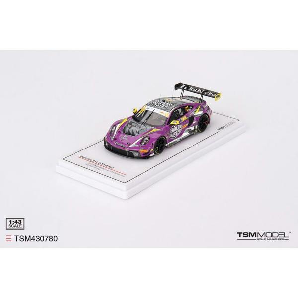 a purple race car on a white surface