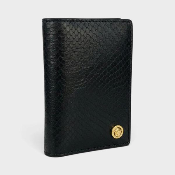 Supplied Fashion black snakeskin-embossed leather card case with a gold Medusa logo emblem.