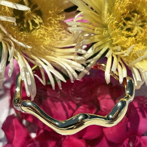 Gold wavy cuff by LENAE London, sculptural bracelet.