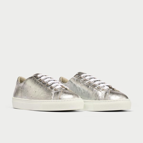 Star silver leather trainer pair