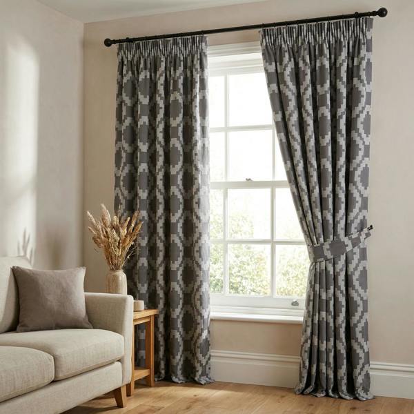 Omni made-to-measure curtains in Charcoal, styled in a living room