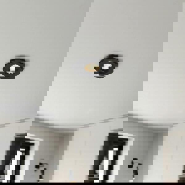 black mini recessed spotlight lamp installed in a modern home 