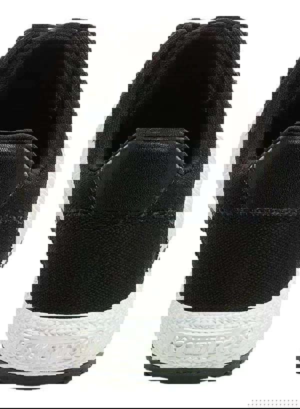 Rocket Dog Cheery Low Womens Casual Lace Up Canvas Shoes Trainers, close-up view of the back of the black and white sneaker highlighting the heel and sole.