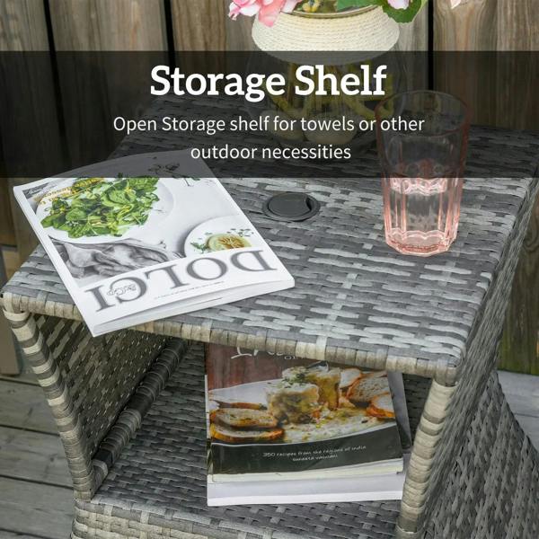 Grey wicker rattan coffee table with open storage shelf for outdoor essentials