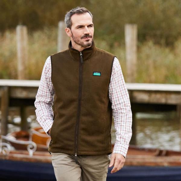 Man with beard wearing Ridgeline Men's Monarch gilet with a check shirt