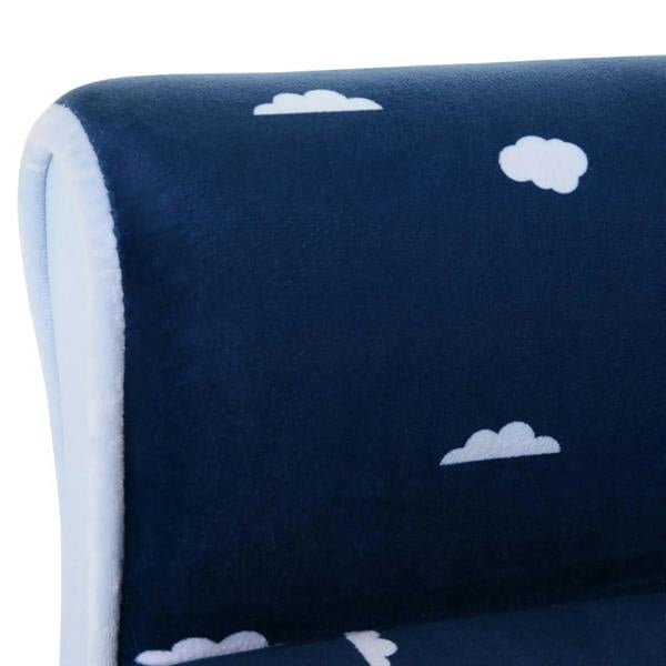 Close-up of dark blue armchair back fabric with small white cloud pattern and light trim