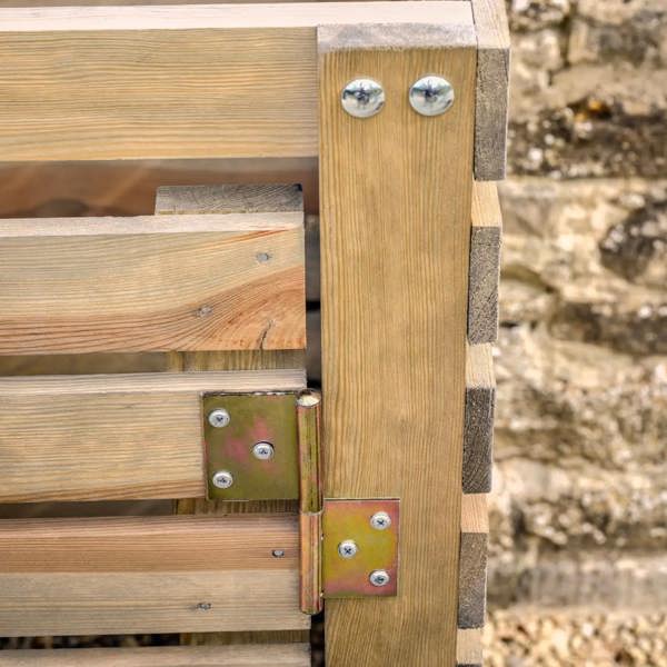 A close-up of the heavy-duty metal hinges and timber craftsmanship on the Natural Spruce Wheelie Bin Store by Abode Home & Gifts.