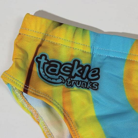 Optimum Tackle Trunks swim brief, close-up of tackle trunks logo on banana and blue waistband - Optimum