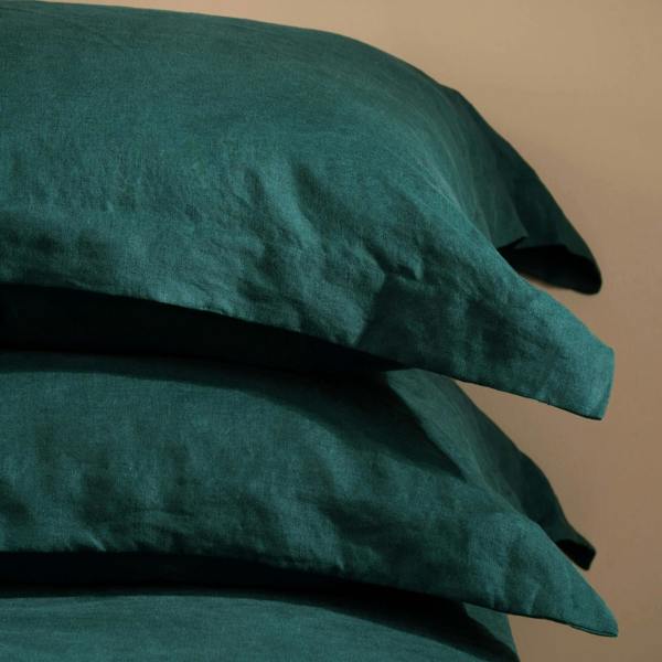 Dark Emerald Green French Linen Bedding and Bed Sheets bedroom detail | Soak and Sleep