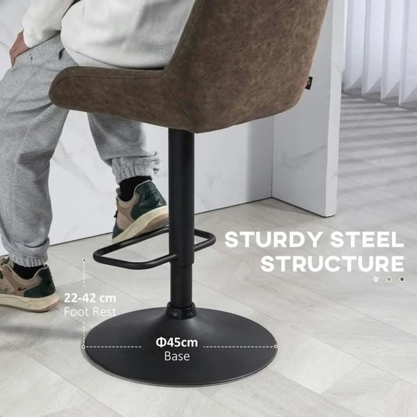 Brown faux leather swivel bar stool with steel pedestal base and circular footrest