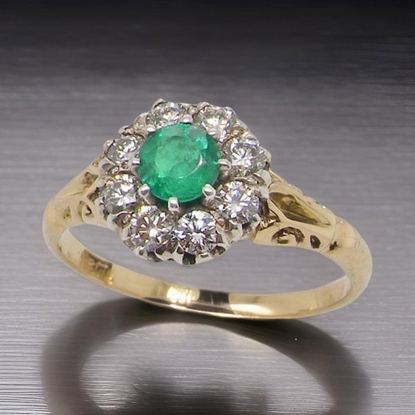 Vintage Tom A vintage Emerald and Diamond cluster ring