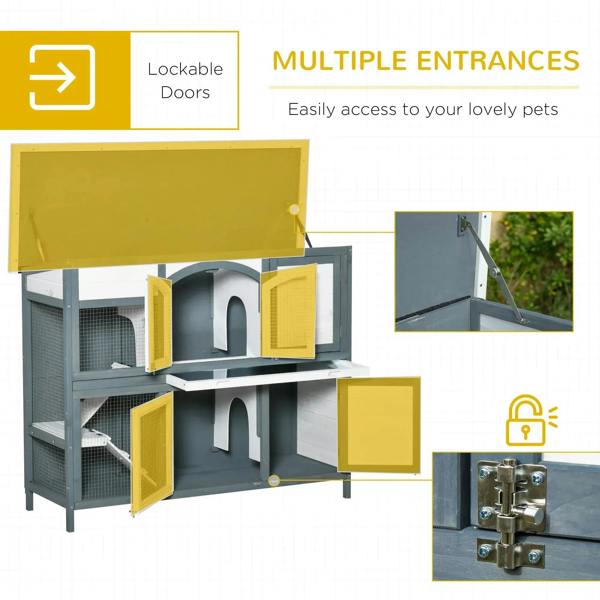 Grey 2-tier rabbit hutch with multiple front entry doors and arched interior access