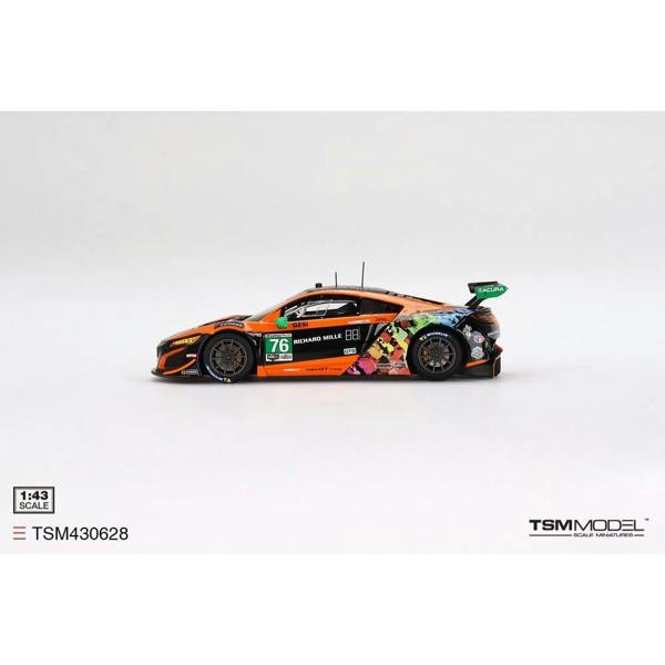a toy car with colorful graphics on it