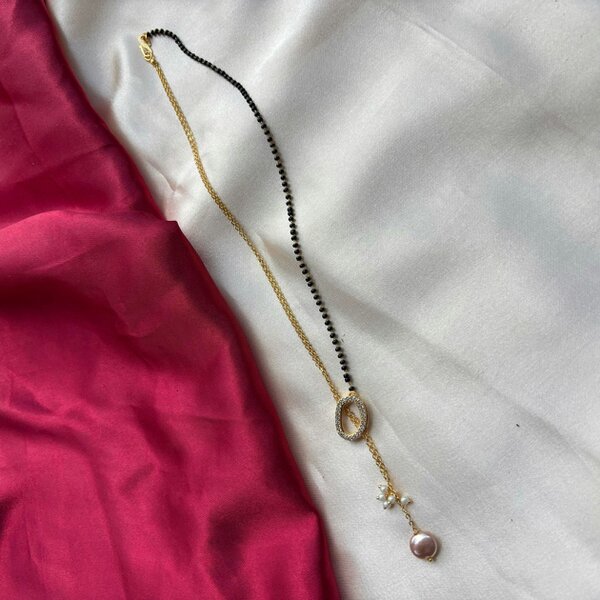 The Colourful Aura Half Black Bead Gold plated Oval Pearl Y shape Lariat Mangalsutra