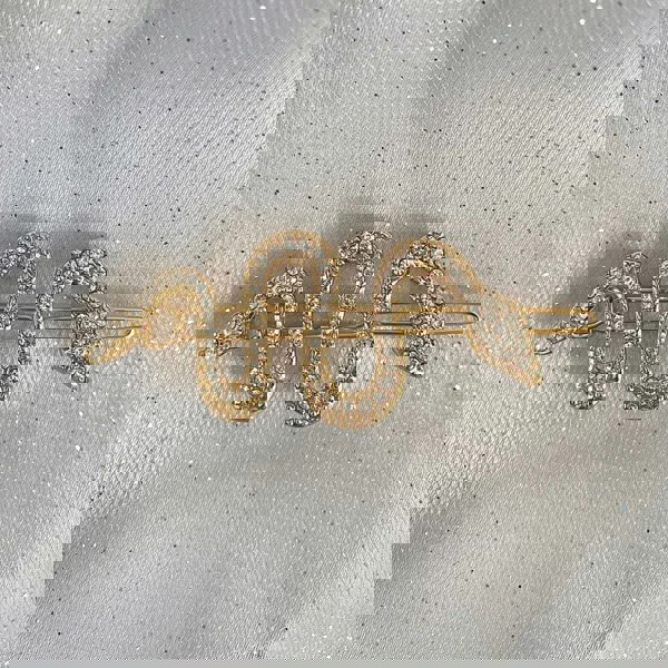 snake hair accessory in gold