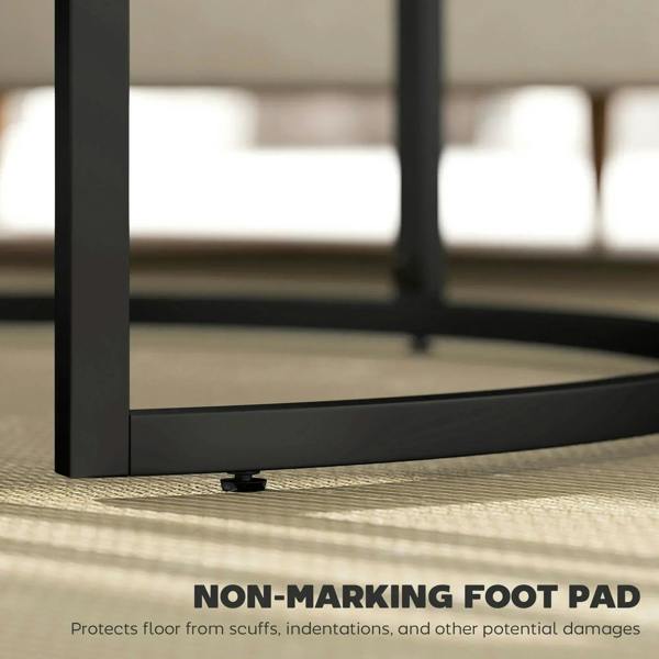 Black steel nesting coffee table frame with non-marking foot pad on floor