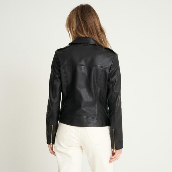 this image shows the back of a barneys originals black leather jacket