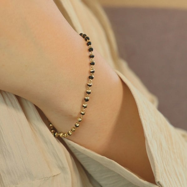 The Colourful Aura Simple plain unisex Gold plated Black beaded Nazar Mangalsutra Bracelet