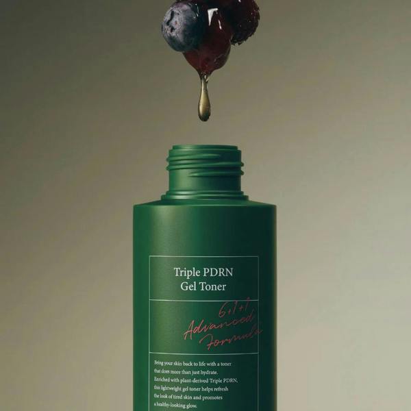 Rich, bouncy, and non-sticky clear gel matrix texture of AXIS-Y Triple PDRN Gel Toner absorbing instantly onto a face canvas at Atelier De Glow UK.