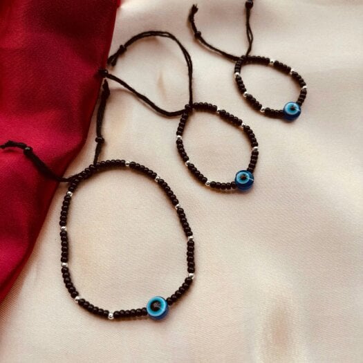 The Colourful Aura Adjustable Black Beads Evil Eye Bracelet For new borns and adults