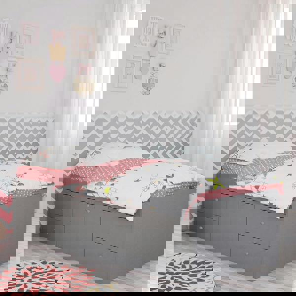 Bed frame in a modernly decorated bedroom.