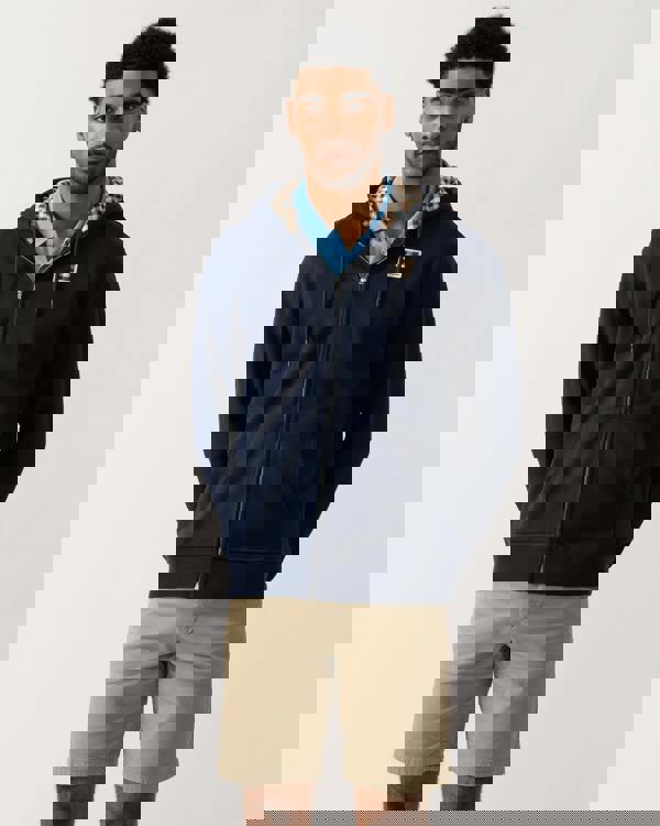 model wearing an Aquascutum Mens Full Zip Badge Hoodie in Navy