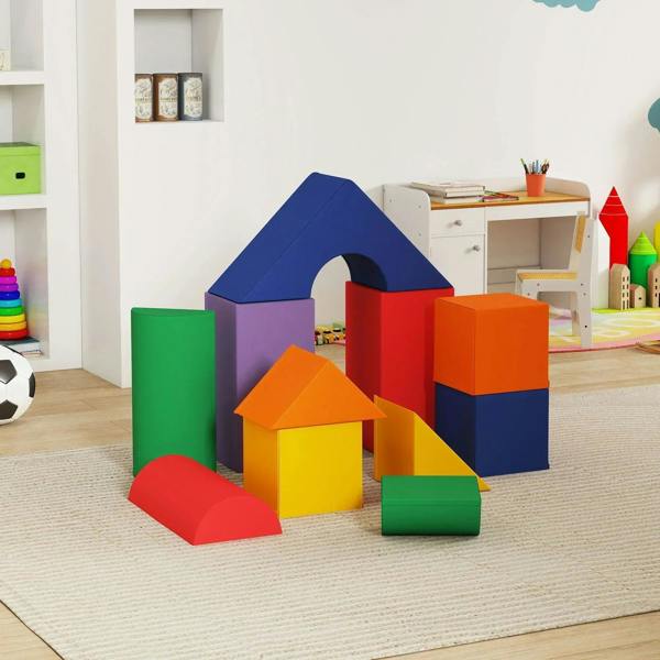 Kids foam play set with colorful blocks forming a playhouse and crawl tunnel