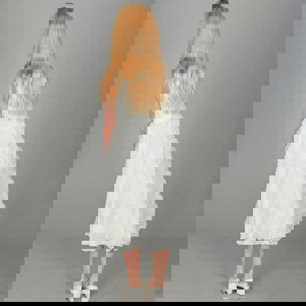 Blond girl in white dress