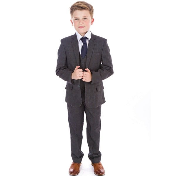 young boy wearing grey suit