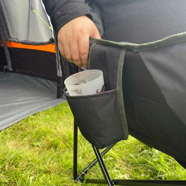 A closeup image of the cupholder of the Olympus XL Camping Chair Black & Green from OLPRO.