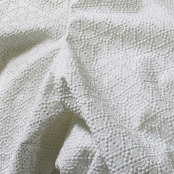 Alaia intricately embroidered cropped jacket in white cotton