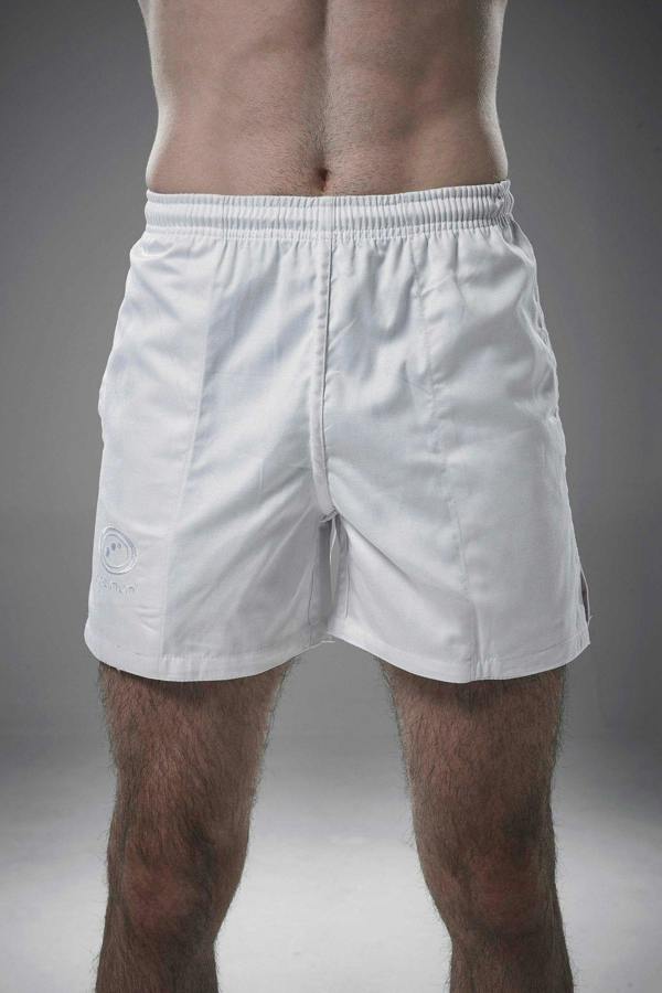 Man wearing white Optimum Auckland rugby shorts front-on with tonal logo on leg, grey background - Optimum