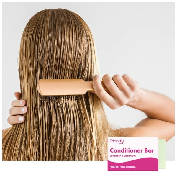 Woman combing her hair