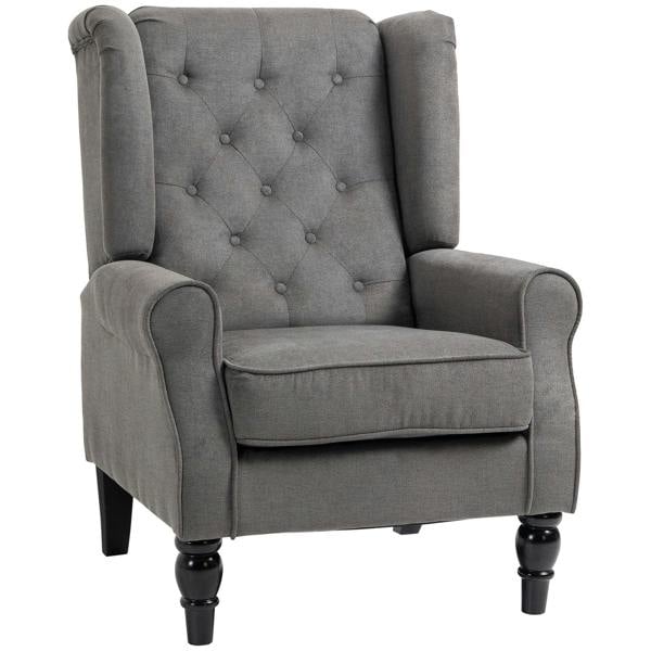 Dark grey wingback armchair with button-tufted back, rolled arms, and fabric upholstery