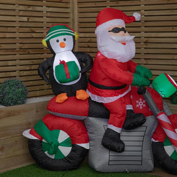 Samuel Alexander 1.8m (6ft) Light up Santa with Penguin on Motorbike Christmas Inflatable with LEDs