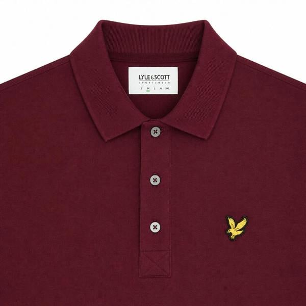 Burgundy Lyle & Scott polo shirt featuring a ribbed collar, three-button placket, and signature golden eagle logo.