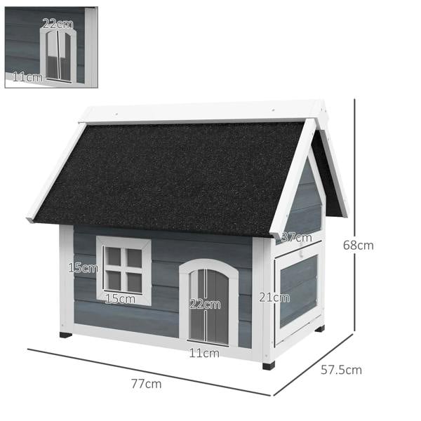 Grey wooden cat shelter with dark asphalt roof, window, and multiple door openings