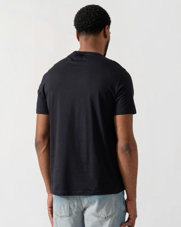 Model wearing Armani Exchange AX Logo T-Shirt in Deep Navy UB101 - back