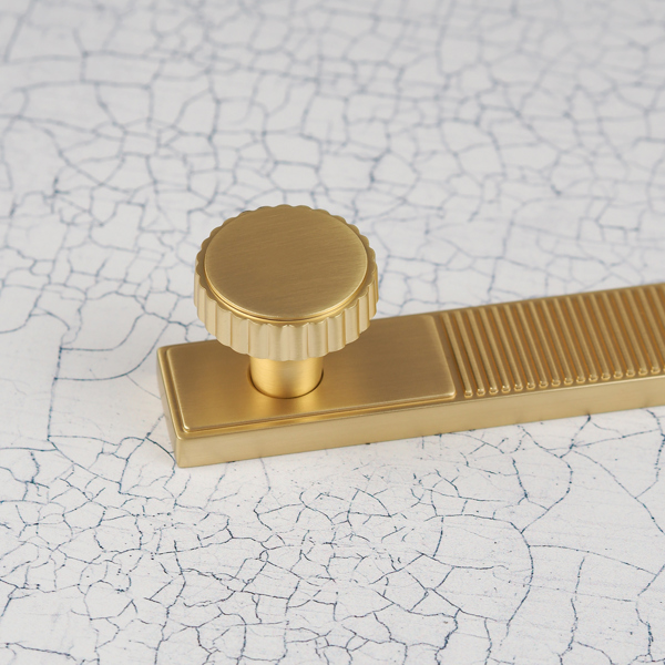 Handle & Home Brushed Brass Ribbed Detailing Handles and Coordinating Knobs